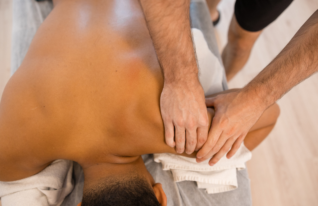 physio treating a patient with shoulder impingement
