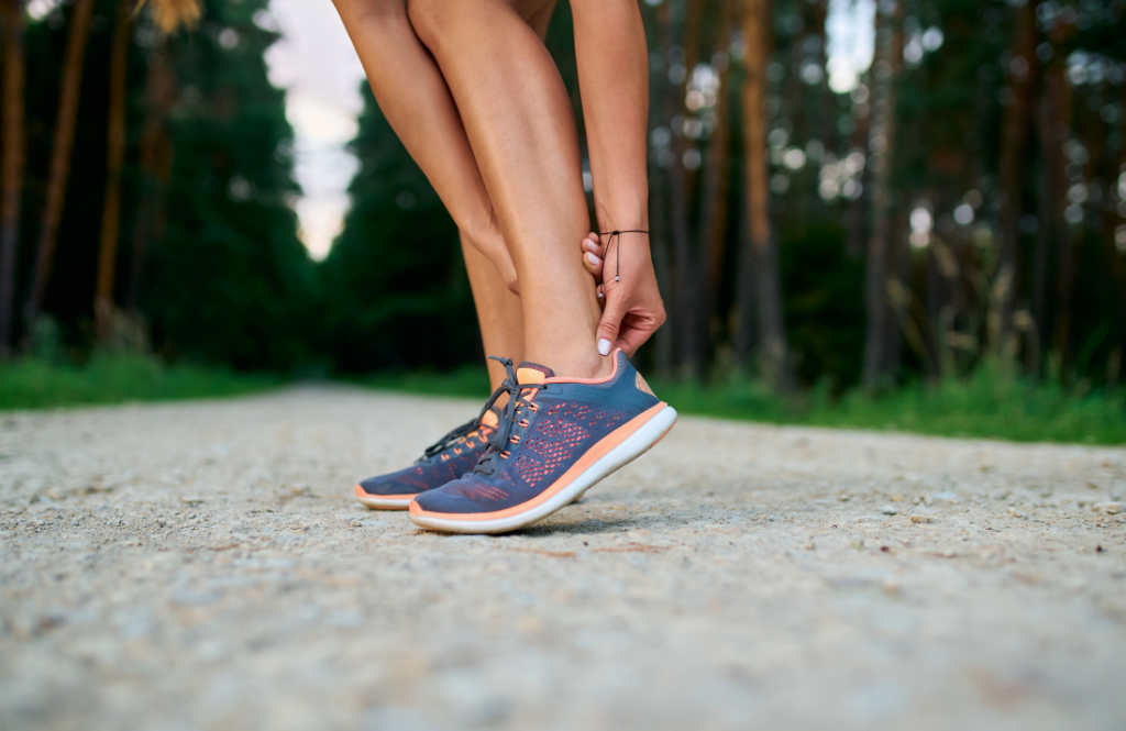 woman with a sore achilles tendon