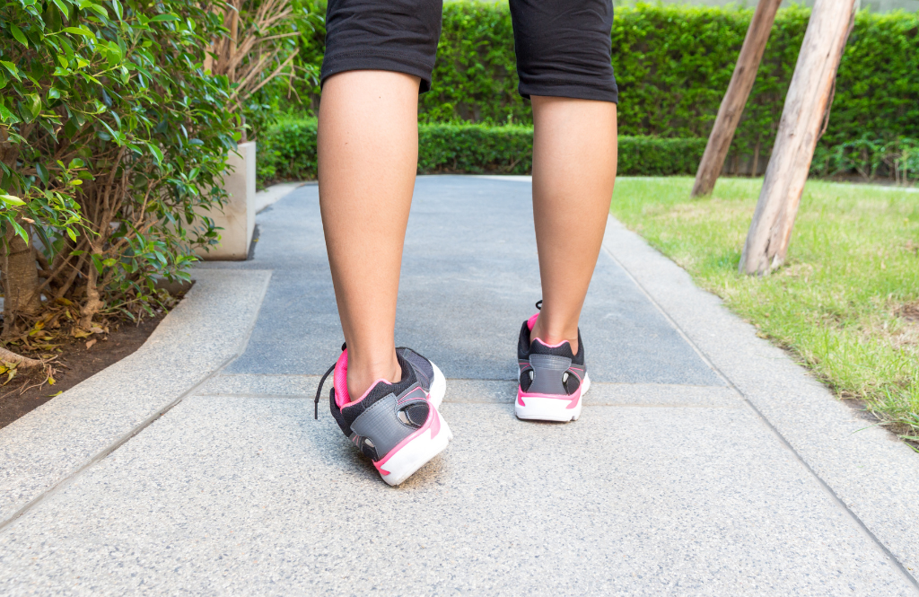 person rolling an unstable ankle while walking